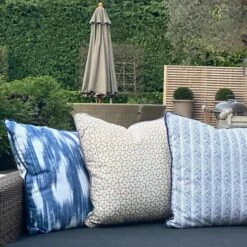 Apulia Navy Outdoor Cushion -Andrew Martin Sale Store 250113 apulia navy audley ochre ostuni stripe navy and burlington ochre outdoor cushions