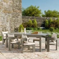 Caicos Dining Chair With Arms Outdoor Dinning Chair -Andrew Martin Sale Store 310120 caicos taupe dining chairs harlyn dining table lifestyle